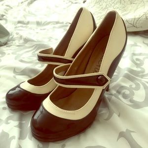 Black and white patent heels.